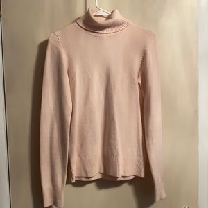 Pink turtleneck